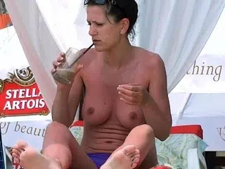 Naughty young nudist girl have fun at the beach